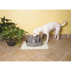 White Dog Drinking from Drinkwell PWW00-13708 Multi-Tier Pet Fountain